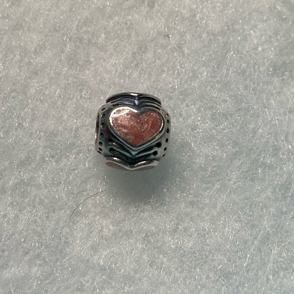 EUC Pandora Rose Enamel Hearts Charm Retired. In excellent condition.